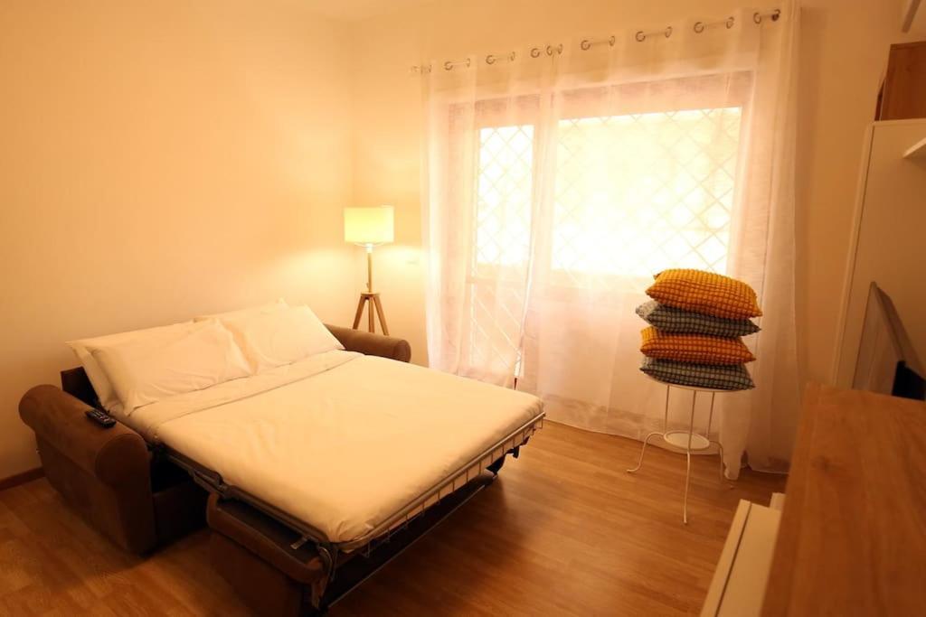 Cozy Coastal Gateway Apartment ลิโด ดิ ออสเตีย ภายนอก รูปภาพ